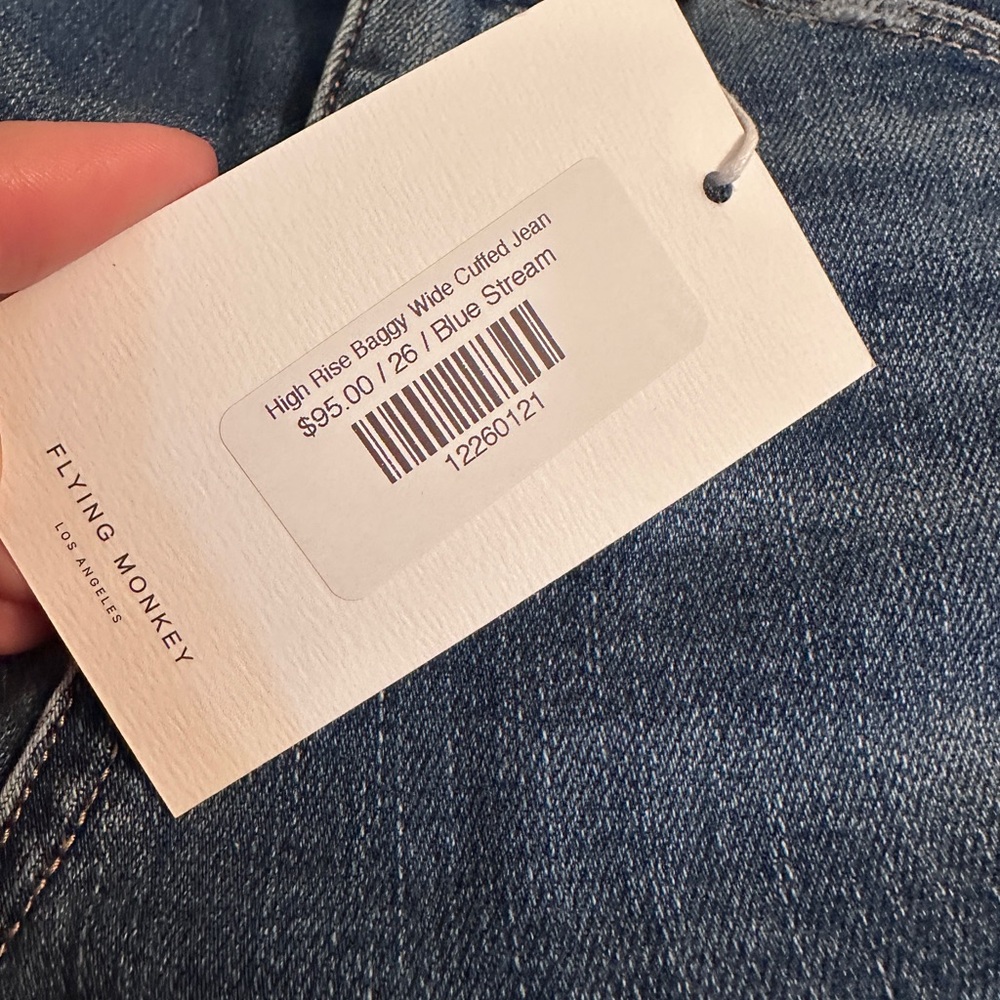 Wide-Leg Distressed Blue Jeans with wide cuff - Picture 2 of 5
